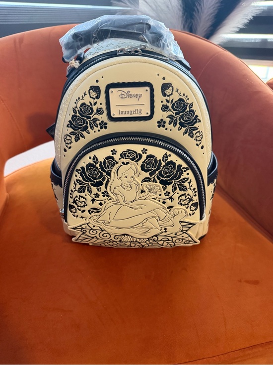 Loungefly Handbags - Loungefly Cream and Black Alice Floral Mini Backpack